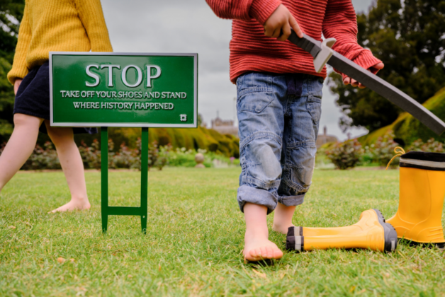 English Heritage signs encourage visitors to ‘Keep on the Grass’